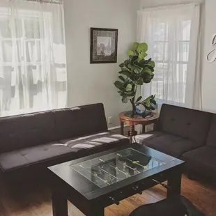 a living room with a couch and a coffee table