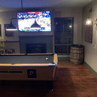 Pool tables and TVs upstairs