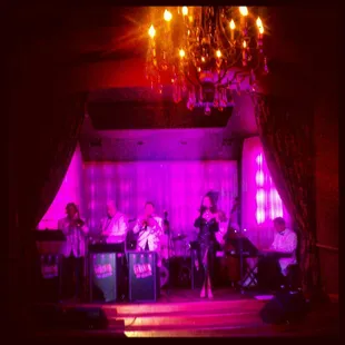 a band playing on stage