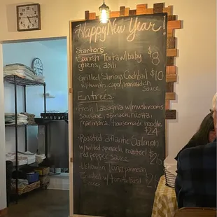a chalkboard with a menu written on it