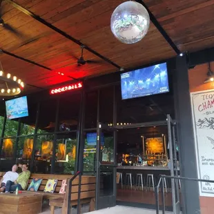 TVs and fans on the patio