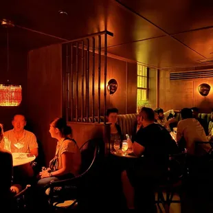 Seating area behind the bar and example of the vibe.