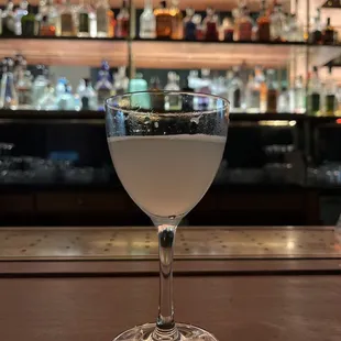 Gin gimlet, bar back drop.