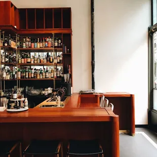 a bar with a lot of bottles