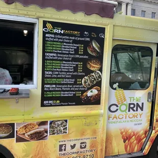 a food truck parked on the side of the road