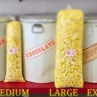 a row of corn poppers