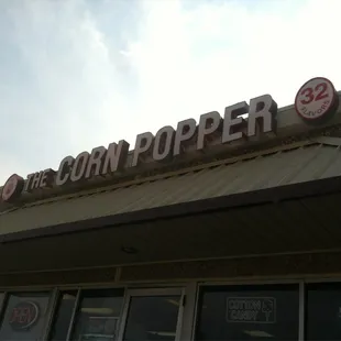 The store front signage for The Corn Popper!