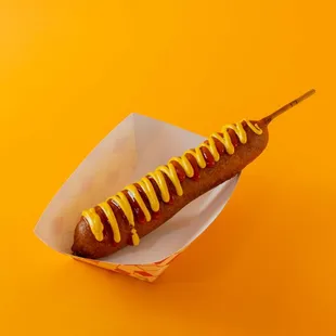 a hot dog with mustard and ketchup