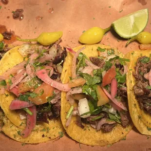 4 tacos only $10 for Friday night #brisket taco slowed smoked brisket