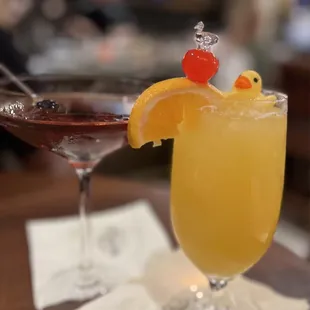 Manhattan and Rubber Ducky Cocktail (Malibu rum, creme de banana, pineapple juice, orange juice and topped with a cute rubber ducky)