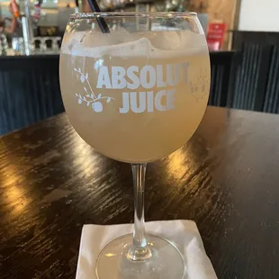 a glass of absolut juice