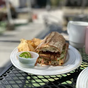 a sandwich and chips on a table