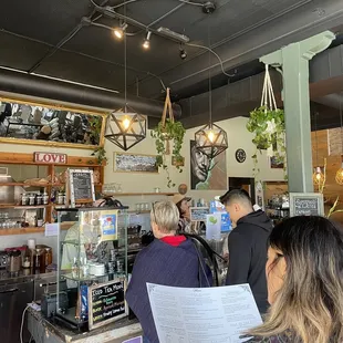 a group of people in a coffee shop