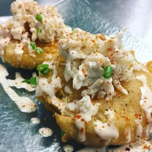 Fried green tomatoes topped with crabmeat