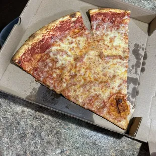 Huge slice of Pizza! I cut mine in half for a bonus slice.