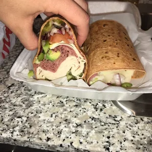 Custom wrap. Turkey pastrami extra avocado, bell pepper, lettuce ect