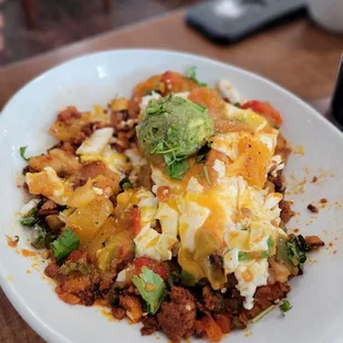 Vaquero scramble made with longaniza and potatoes- favorite