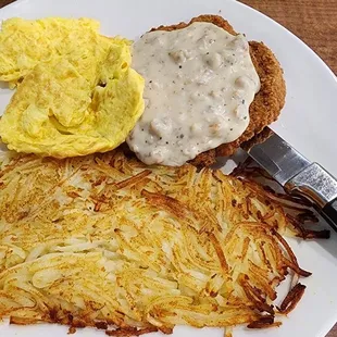 Chicken fried steak with scrambled eggs