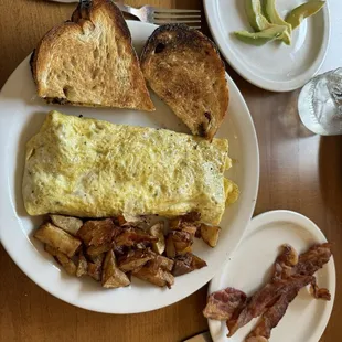 Ribeye Omelette, crispy potatoes, white toast, side of bacon and side of Quarter Avocado.