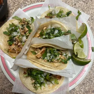 Chicken tacos missing salsa.