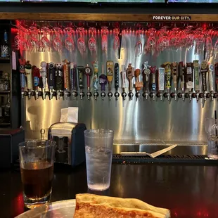 a slice of pizza on a plate