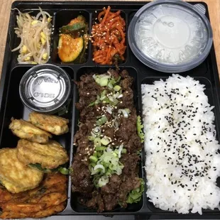 Bulgogi (Marinated Sliced Beef Tenderloin) Lunch Special. Includes kimchi jeon, zucchini jeon, and Korean meat and tofu pancake.