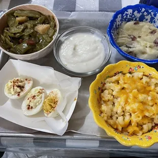 Four item plate: green beans, deviled eggs, Mac &amp; cheese, mashed potatoes with cream cheese (with white gravy)