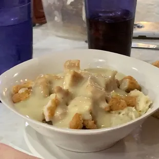 Mashed potato bowl:  it has fried chicken pieces, corn, bacon, gravy.