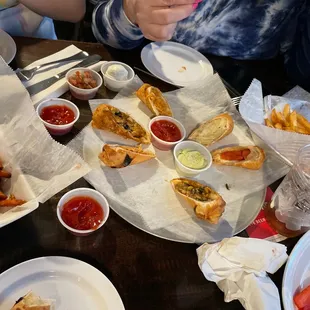 Sweet potato fries, regular fries and many of their egg rolls to try.