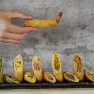 a person holding a piece of bread