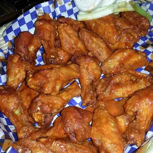 a basket of chicken wings