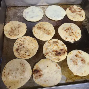 tortillas being cooked