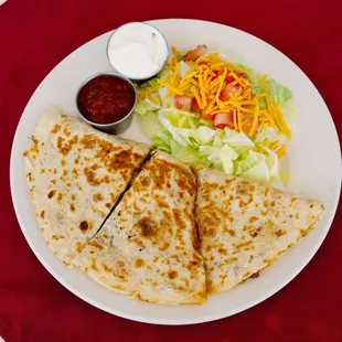 a quesadilla and salad
