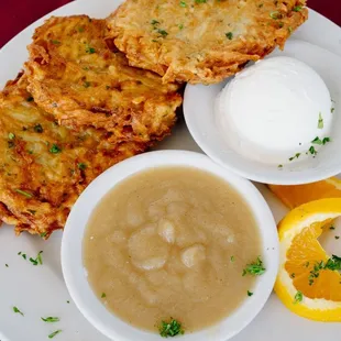 potato pancakes with apple sauce and sour cream