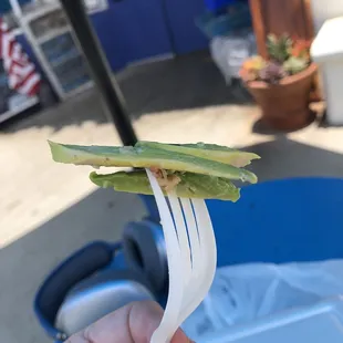 1/16&quot; to 1/8&quot; slivers of one small piece of avocado for $2.00