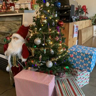 a christmas tree and presents