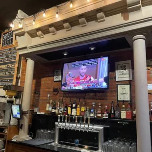 a television in the bar