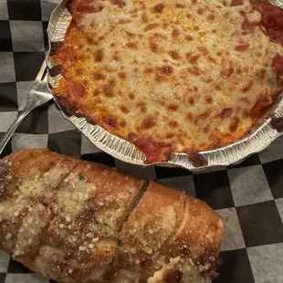 Lasagna and cheesy garlic bread