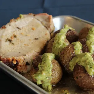 Roasted Pork Tenderloin with Herbed Potatoes and Avo-stachio Sauce