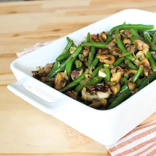 Green beans with mushrooms and cipollini onions.