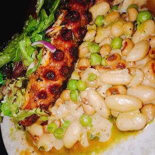 Charred pulpo  OCTOPUS, FARMERS MARKET BUTTERED BEANS + FIELD PEAS, BLACK EYED PEAS, PARMESAN BUTTER, CHIVES