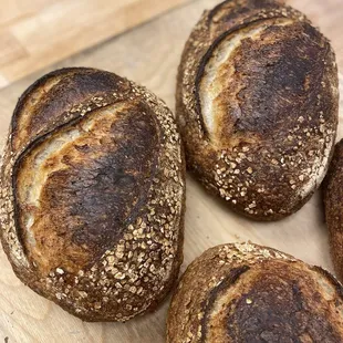 Oat Porridge Honey Sourdough - Naturally-leavened,  includes cooked oats and is sweetened with local honey.