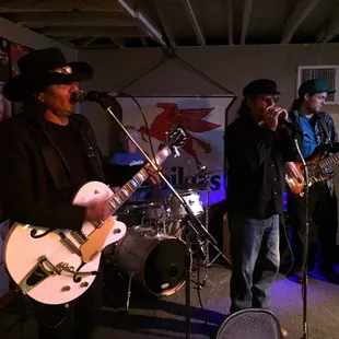 a group of musicians performing on stage