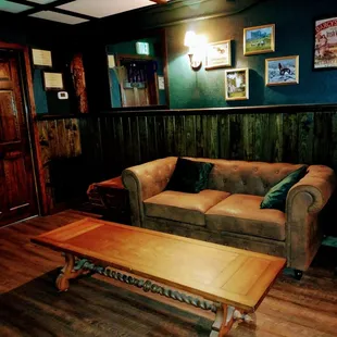 Leather loveseat facing stage