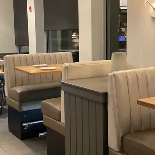 a dining area with booths and tables