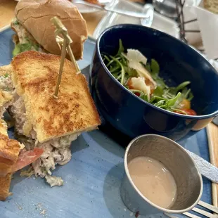 A chicken salad sandwich (buttery, crispy bread) an organic arugula salad. A friend had a grilled chicken sandwich &amp; sweet potatoes fries.
