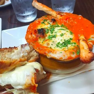 Pizza Soup- Tomato bisque, crostini, broiled mozzarella, grana padano.