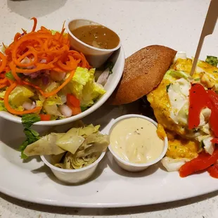 custom burger with a side salad