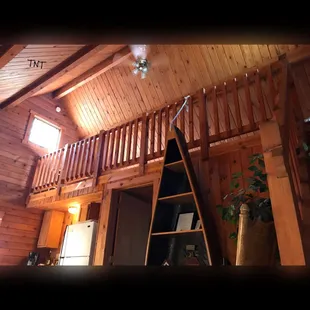a ladder leading to a loft