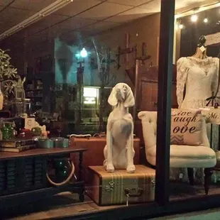 A evening view of the front windows at   The  Country Duck.